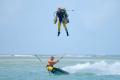 Kitesurfer Jeremie Tronet defies jet suit pilot Richard Browning